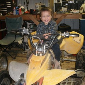 Another Pic of Tristyn on the 90 and the 125 next to it in the shop. resize resize