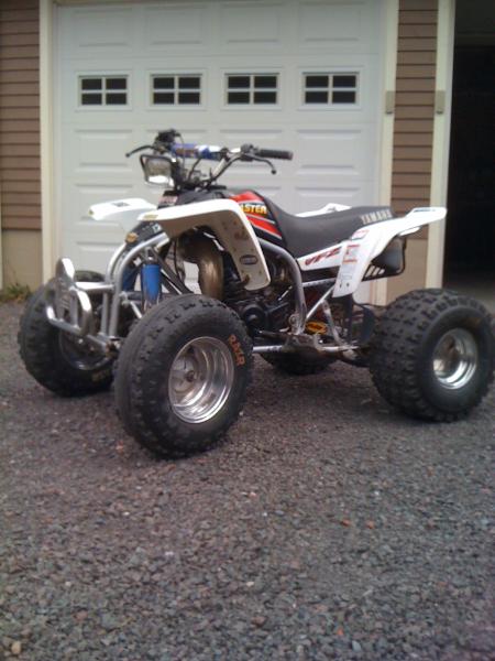 "Look at all pics for full story"1999 Yamaha Blaster 200 two stroke... with working oil injection.. runs amazing!! has made me very happy! and changed my mind about blasters all together!
DG front and rear bumper
Douglas aluminum race wheels all around
BKT xdriv tires rear
Maxxis razr front.
very clean plastic and seat.
Full FMF exhaust 
Twinair Filter
New DID sprockets and chain
Durablue axle and hubs on rear
Flay bars
and now Motorsports Products Nerfbars.
Some new electrical parts. Fresh rebuild, and all seals and bushings replaced. 
brand new brake pads, shoes, and cables..