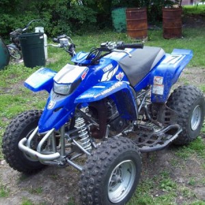 my quad i now have powermadd handguards, itp holeshots, and pivot works a arm kit