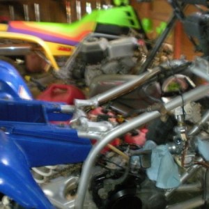 taken apart we found the intake and base gaskets blown and yes that is a banshee in the background its my dads