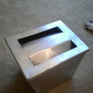 my aluminum airbox that I made, in the works! got to get motor back on the frame before I can do the pipe/intake part!