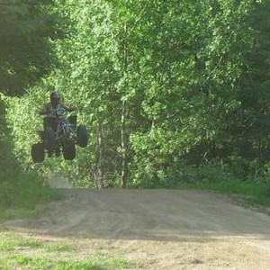 Todd going over a jump at Lakeview ATV park, Solon,Iowa