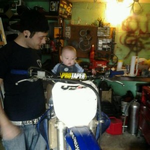 my five month old son devin sitting on my 250f