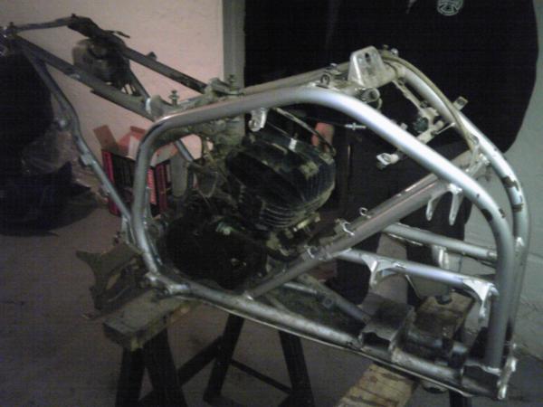 Day 2
Steering Stem
Axle
Gas Tank
Rear Suspension
Foot Pedals


Am currently fighting to take swingarm/engine bolt out to take the motor and swing arm out of frame, then its ready to be sand down