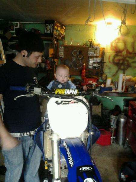my five month old son devin sitting on my 250f