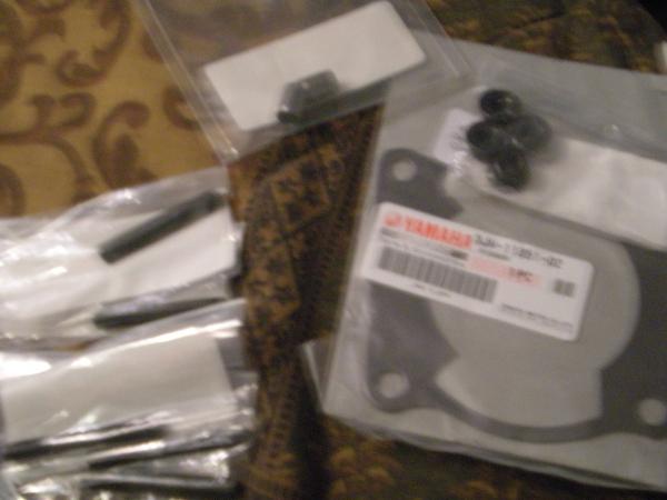 new parts..... guides, studs(2 extras ;) ) base gasket and nuts... lol