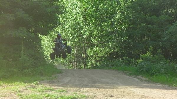 Todd going over a jump at Lakeview ATV park, Solon,Iowa